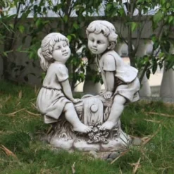 B&M Boy & Girl Seesaw Garden Statue