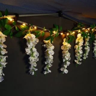 Solar Powered 180cm Artificial Leaf Garland With Wisteria Flowers - Warm White 1 Solar Powered 180cm Artificial Leaf Garland With Wisteria Flowers - Warm White